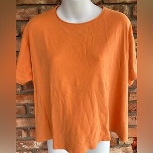 Coldwater Creek short sleeve orange top. Hits at waist.